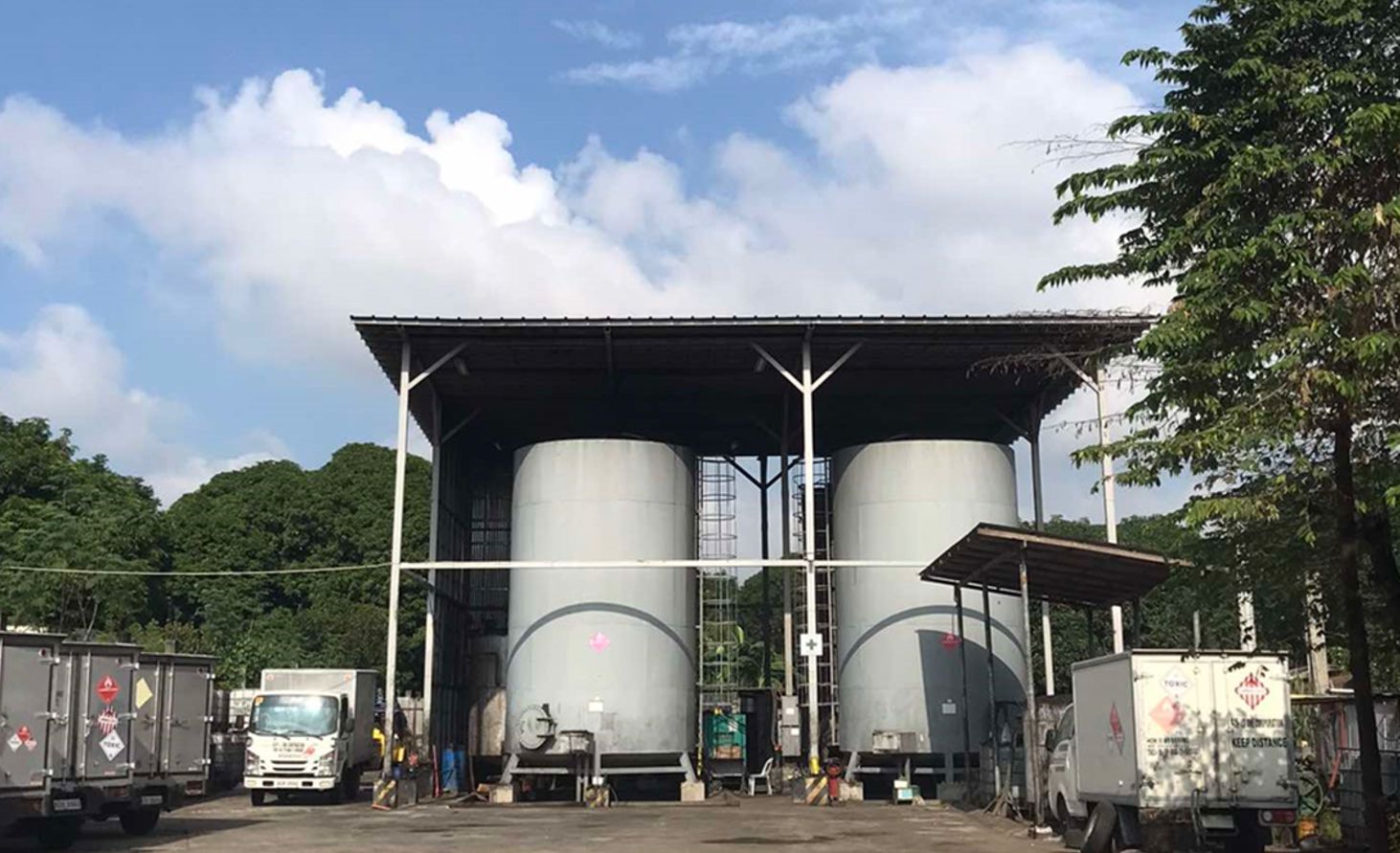 LS ONE CORPORATION storage tanks and trucks in General Trias, Cavite